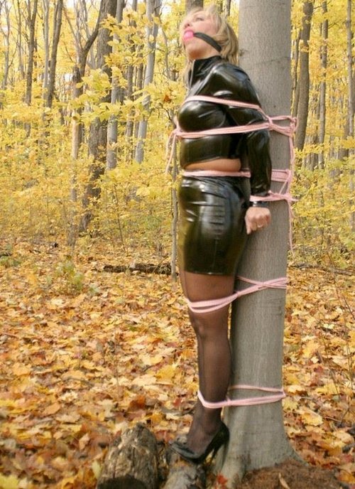 latex skirt and top forest bondage