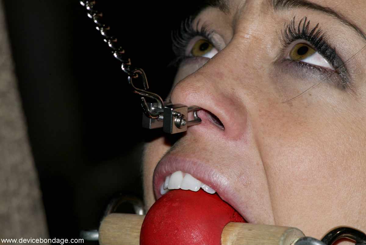 ball-gagged and pirced